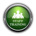 Green circular icon with a white icon of three people and the text STAFF TRAINING.